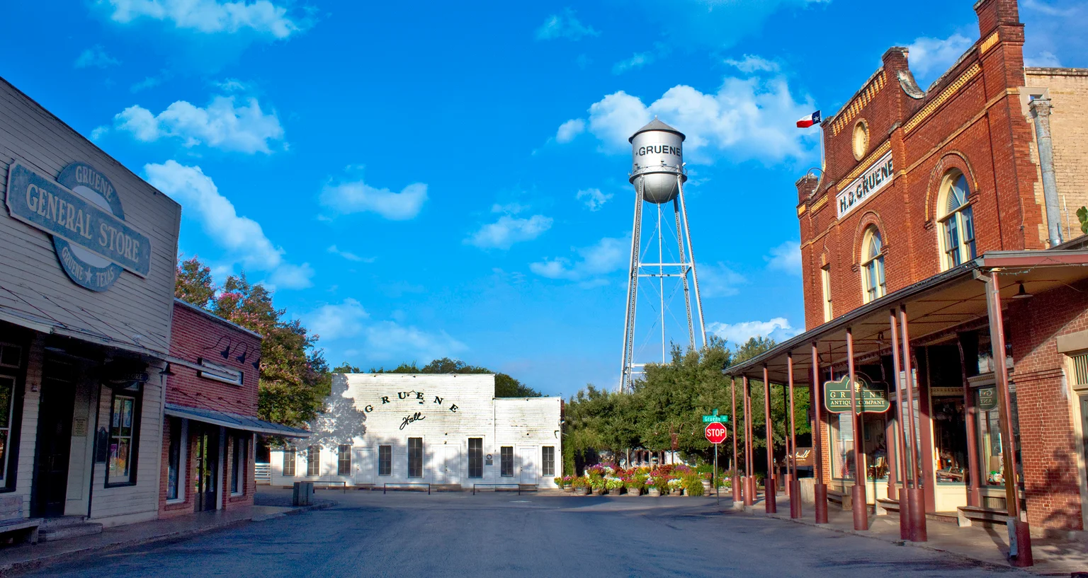 Historic storefronts and a water tower in New Braunfels
