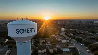 Schertz water tower and surrounding neighborhoods at sunset