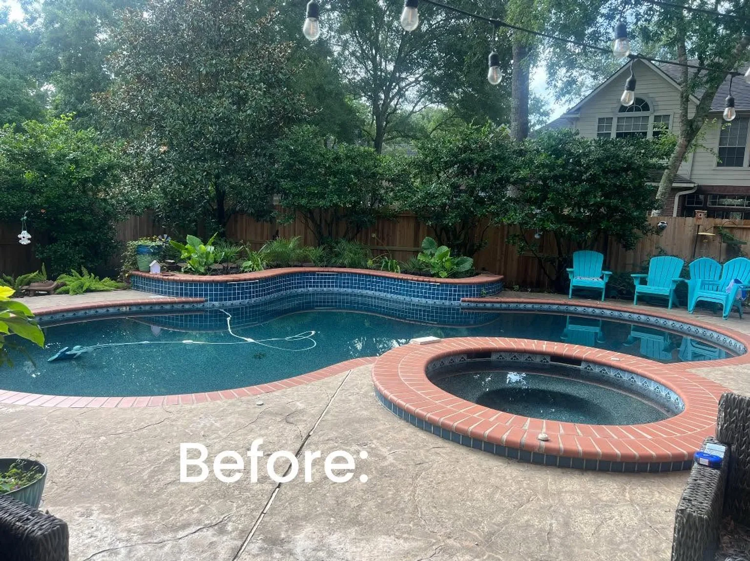 Pool and spa before renovation with red coping and blue tile